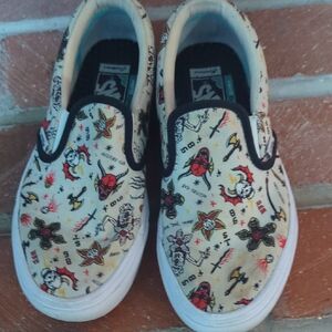 Vans Stranger Things  Hellfire Club Cream Slip-On Sneakers